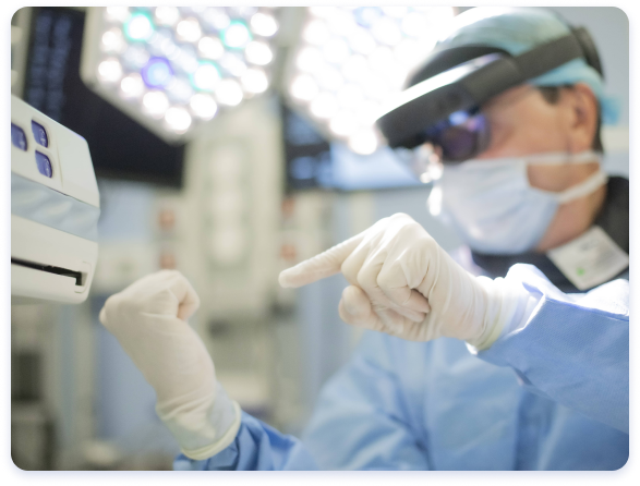 a surgeon uses the ASARIA augmented reality headset